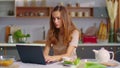 Businesswoman typing on laptop at remote workplace. Woman working on laptop Royalty Free Stock Photo