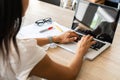 Businesswoman typing on laptop at workplace Woman working in home office hand keyboard