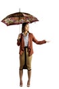 Businesswoman with an umbrella feeling the rain