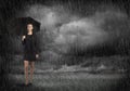 Businesswoman with umbrella