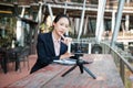 Businesswoman use smartphone for online live streaming. woman re Royalty Free Stock Photo