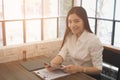 Businesswoman use tablet to analyze market chart at workplace. y Royalty Free Stock Photo