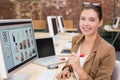 Businesswoman using computer at office desk