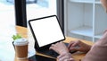 Businesswoman using computer tablet searching information at office desk. Royalty Free Stock Photo