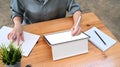 Businesswoman using tablet searching information at office desk. Royalty Free Stock Photo