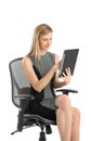 Businesswoman Using Digital Tablet While Sitting On Office Chair Royalty Free Stock Photo