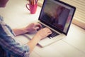 Businesswoman using her laptop at desk Royalty Free Stock Photo