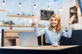 Businesswoman using laptop in cafe Royalty Free Stock Photo