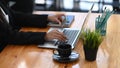 Businesswoman using laptop computer and holding credit card making online payment or online shopping. Royalty Free Stock Photo