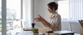 Businesswoman using laptop computer making video conference with her business partner at her workplace. Royalty Free Stock Photo