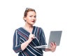 businesswoman using laptop and doing idea gesture
