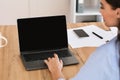 Businesswoman Using Laptop With Empty Screen Working In Modern Office Royalty Free Stock Photo