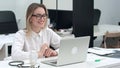 Businesswoman using laptop for video call