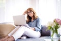 Businesswoman using laptop while working from home Royalty Free Stock Photo