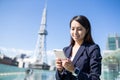 Businesswoman using mobile phone Royalty Free Stock Photo