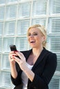 Businesswoman using smartphone Royalty Free Stock Photo