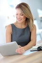 Businesswoman using tablet at office Royalty Free Stock Photo