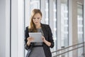Businesswoman using tablet PC in office Royalty Free Stock Photo