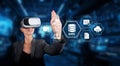 Businesswoman using virtual reality technology for data management and cloud computing solutions in a modern digital Royalty Free Stock Photo