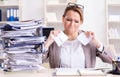 Businesswoman very busy with ongoing paperwork