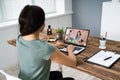 Businesswoman Video Conferencing On Computer