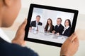Businesswoman Video Conferencing On Digital Tablet