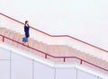 Businesswoman walking down stairs Royalty Free Stock Photo