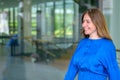 Businesswoman walking forwards to welcome a client Royalty Free Stock Photo