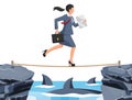 Businesswoman walking tightrope over shark in sea Royalty Free Stock Photo