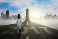 Businesswoman walking toward arrow with 2017 Royalty Free Stock Photo