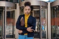 woman wearing office suits with digital tablet, waiting near the business centre. business partners concept Royalty Free Stock Photo