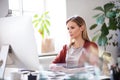 Businesswoman in wheelchair at the desk in her office. Royalty Free Stock Photo