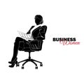 Woman in business suit. Businesswoman sits in a chair and reads a newspaper