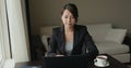 Businesswoman work laptop computer at hotel room Royalty Free Stock Photo