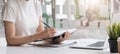 Businesswoman work with paper document on clipping board in office