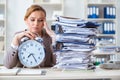 The businesswoman workaholic trying to finish urgent paperwork Royalty Free Stock Photo