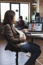 Businesswoman working on company financial diagram chart, analyzing statistics report Royalty Free Stock Photo