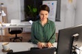 Businesswoman working on computer at night office Royalty Free Stock Photo