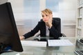 Businesswoman working on computer Royalty Free Stock Photo
