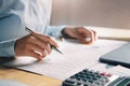 businesswoman working on desk check data of finance