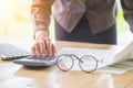 businesswoman working on Desk office business financial accounting calculate, Graph analysis. vintage filter. Royalty Free Stock Photo