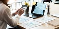 businesswoman working on desk office with using a calculator to calculate the numbers, finance accounting concept. Royalty Free Stock Photo