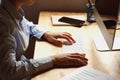 businesswoman working on desk using laptop for check data of finance in office