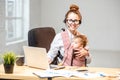 Businesswoman working with her baby son at the office Royalty Free Stock Photo