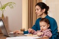 businesswoman working at home with her little child girl Royalty Free Stock Photo