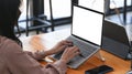 Businesswoman working on laptop computer. Royalty Free Stock Photo