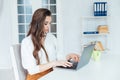 Businesswoman working on laptop in office small business online Royalty Free Stock Photo