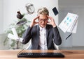 Businesswoman working on a laptop, overworking, under pressure Royalty Free Stock Photo