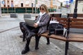 businesswoman working remotely on a laptop in the city, running a successful business Concept