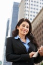 Businesswoman Working On Tablet Computer Outside Office Royalty Free Stock Photo